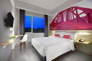 Letto o letti in una camera di favehotel Sudirman Bojonegoro