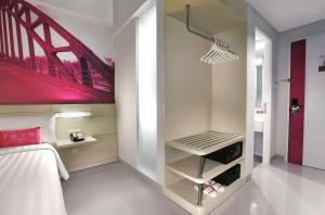 Letto o letti in una camera di favehotel Sudirman Bojonegoro