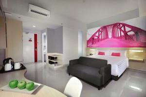 Letto o letti in una camera di favehotel Sudirman Bojonegoro