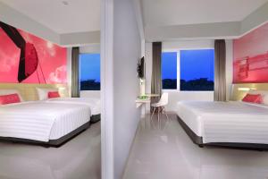 Letto o letti in una camera di favehotel Sudirman Bojonegoro