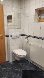 Kúpeľňa v ubytovaní FeWo Ames