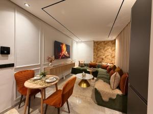 a living room with a couch and a table at Luxury Studio Casa Center in Casablanca