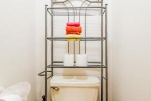 a towel rack over a toilet in a bathroom at Paradise Villas #16 in Playa Encanto +19 photos