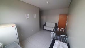 a small room with chairs and a couch in it at Apt 402 Ed Nilson Pimentel in Barreiras