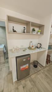 a kitchen with a counter with a counter top at Suite de Lujo Castañitas in Tafí del Valle