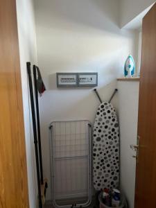 a small bathroom with a metal cart in a room at Ferienwohnung Landliebe in Pinswang +33 photos