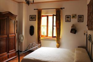 Ένα ή περισσότερα κρεβάτια σε δωμάτιο στο Casa Le Celle