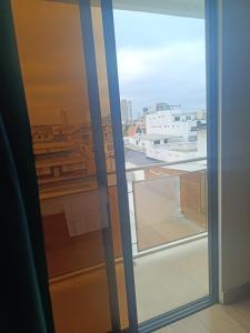 a view of a city from a window at Hotel Stella blu in Manta