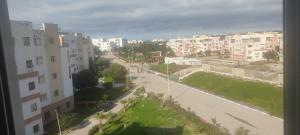 a view of a street in a city with buildings at Appartement à Sable d'or tanger in Tangier