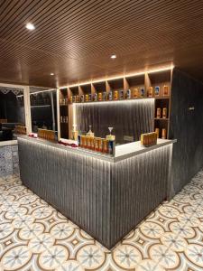 a lobby with a bar in a hotel at Royale Serenity in Gangtok