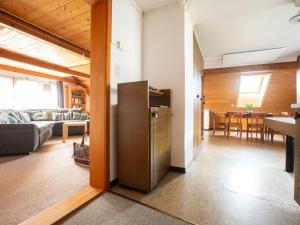 a room with a kitchen and a living room at Apartment Hof Bommes by Interhome in Gais