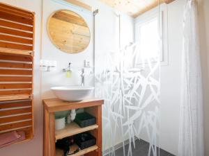 a bathroom with a sink and a shower at Apartment Hof Bommes by Interhome in Gais +17 photos