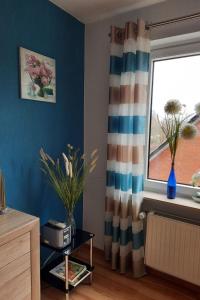 a living room with a window and a table at Apartment Gill by Interhome in Stelle