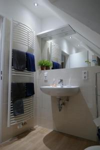 a bathroom with a sink and a mirror at Apartment Gill by Interhome in Stelle