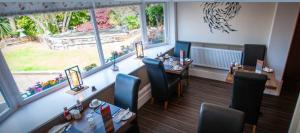an overhead view of a restaurant with tables and chairs at Hambledon Hotel in Shanklin