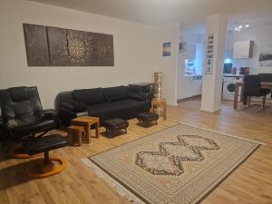 Posezení v ubytování FORUZ - Apartment mit Balkon und Tiefgarage