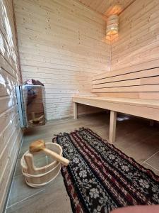 a room with a sauna with a bench and a rug at Hello Balaton in Alsóörs +76 photos