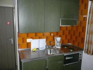 a kitchen with a sink and a counter top at Apartment Chesa Margretta by Interhome in Sils Maria