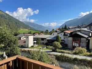 a view from the balcony of a village in the mountains at Apartment Chasa Jaro by Interhome in Santa Maria Val Müstair