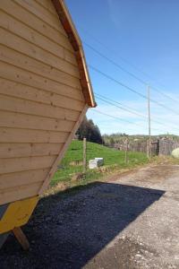 awning of a building on top of a dirt road at Holiday Home Tiny Hause by Interhome in St. Gallen