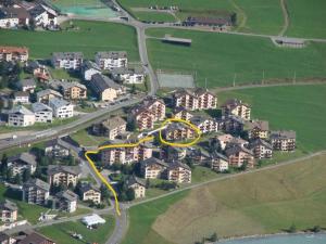 an aerial view of a road with a yellow circle at Apartment Culaischem 2 by Interhome in Zuoz
