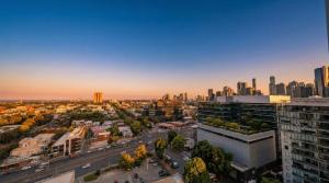an aerial view of a city at sunset at Domain House Executive in Melbourne +3 photos