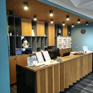 an office with a long desk with chairs and tables at Apartman Iva Brzeće-Kopaonik in Brzeće