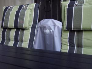 a pile of ties and a shirt on a shelf at Apartment Harzgrün by Interhome in Sankt Andreasberg +13 photos