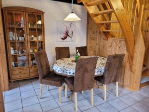 a dining room with a table and chairs at Holiday Home Lea by Interhome in Bremke