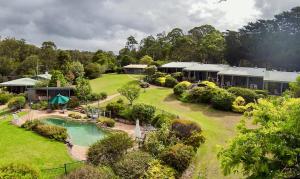 an aerial view of a house with a pool at Gipsy Point Lakeside in Gipsy Point
