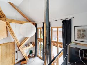 a room with white walls and wooden beams at Apartment Spiegl by Interhome in Waizacker +14 photos