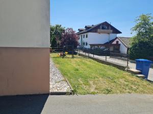 a view of a house from the corner of a building at Apartment Lusen by Interhome in Frauenau