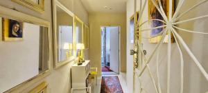 a room with a door with a mirror and a hallway at COPSE0102 - Edifício Themis in Salvador +40 photos