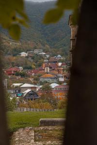 a view of a town from a window of a city at Zeyzid Glamping Sheki in Sheki