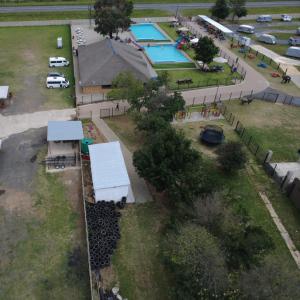 an aerial view of a park with a swimming pool at DSC Family Fun Park in Standerton