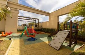 a play area with a playground with a slide at Studio Flat - Guarulhos -Airport Aeroporto - Bosque Maia - Cidade Maia in Guarulhos