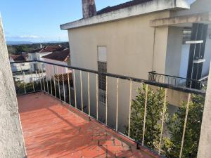 a balcony of a apartment building with a view at GamaBarros1-Charneca in Charneca