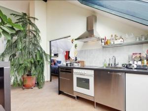 a kitchen with a sink and a stove at Apartment Immas Welt by Interhome in Utting am Ammersee