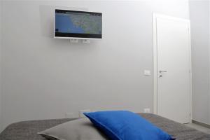 Televízia a/alebo spoločenská miestnosť v ubytovaní B&B Pika 48