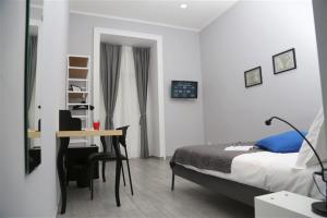 Televízia a/alebo spoločenská miestnosť v ubytovaní B&B Pika 48