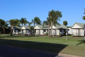 a row of houses on the side of a street at Central Tourist Park in Mackay
