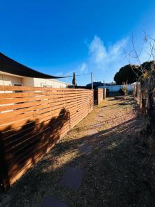 a wooden fence in front of a building at 'Your Place on Davidson' Uno in Mount Isa
