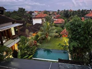 an aerial view of a resort with a swimming pool at Puji Bisma Ubud in Ubud