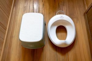 a toilet and a speaker on a wooden floor at Rebe東吉野 in Higashiyoshino +55 photos