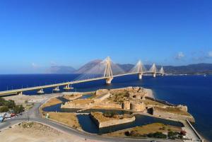 a bridge over a large body of water at Zeus Beach Condo in Vernardhaíika