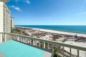 a balcony with a view of the beach at Catalina 902-Updated Beachfront Condo with Amazing Views-Full Service Resort in Gulf Shores