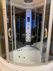 a view of a jacuzzi tub in a room at Hotel victoria prime in Surat