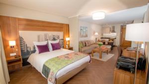 Postel nebo postele na pokoji v ubytování Melliber Appart Hotel