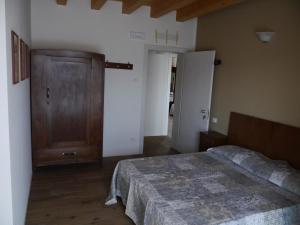 Postel nebo postele na pokoji v ubytování El Sesterzio