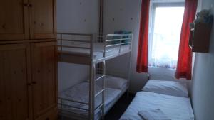 Postel nebo postele na pokoji v ubytování Hotel Bozi Dar - Excalibur